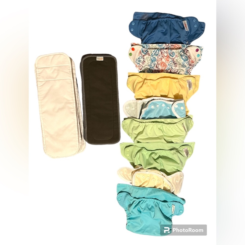8 Flip cloth diapers with 8 white and 6 grey inserts
